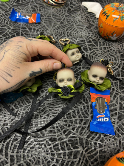 mini babydoll head bag charms